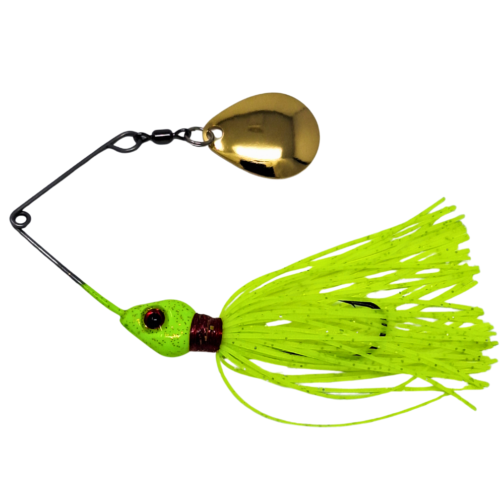 Fishing lure with a gold blade and green skirt on a white background